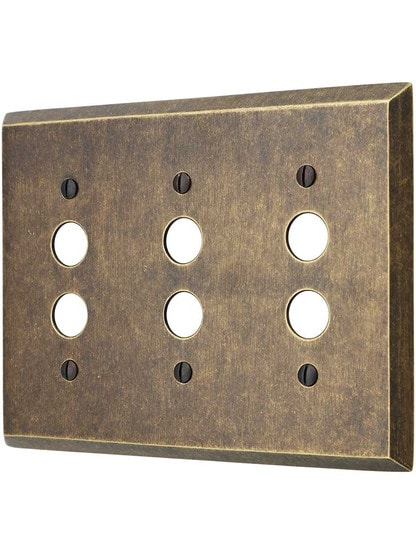 Traditional Forged Brass Triple Gang Push Button Switch Plate in Antique Brass.